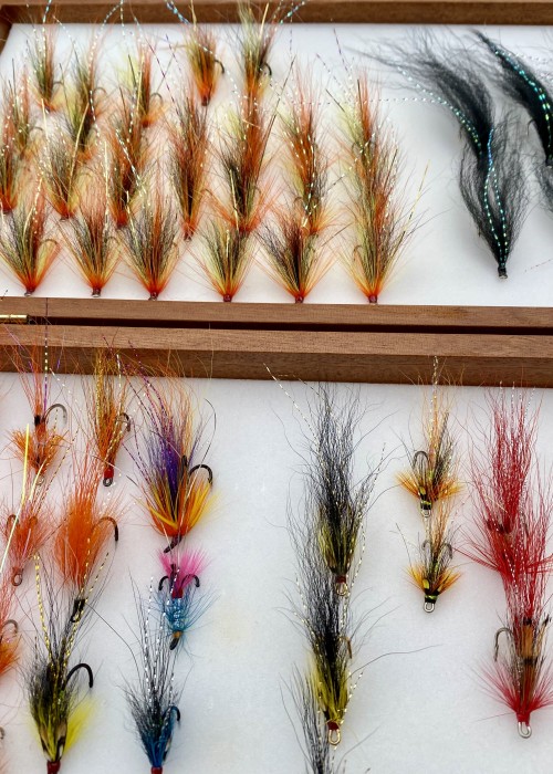 What a nice selection of Scottish salmon flies to choose from at the start of the fishing day. Rather than lugging a big fly box around like this simply select a few at the start of the fishing day to match the water conditions and put them in a smaller fly box in your pocket.